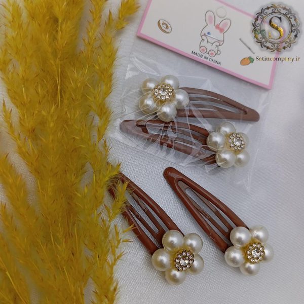 گیره مو تق تقی دخترانه طرح گل مرواریدی